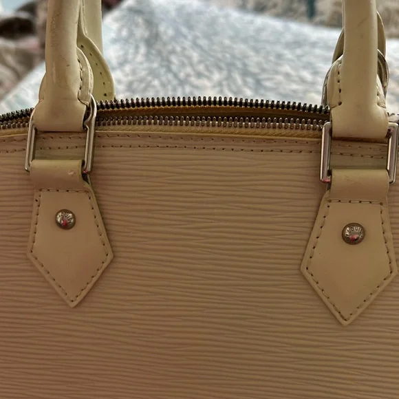 Authentic Louis Vuitton Ivory Epi Alma Textured Leather Bag - Picture 10 of 15